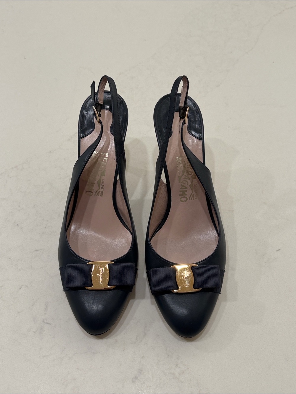 Salvatore Ferragamo Black Leather Slingback Pumps with Gold Bow Plaque